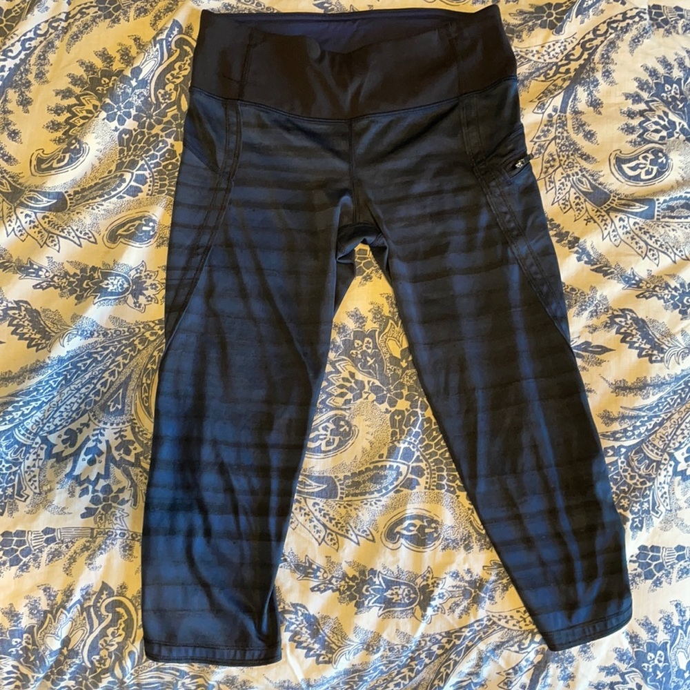 Lululemon Capri leggings. Navy blue and black size 4. Lightly worn.